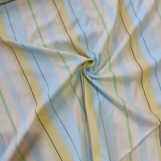 Jednolícní úplet svisle pruhovaný modrožlutý